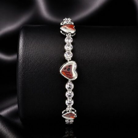 Pulsera con circonita y eslabones de corazón