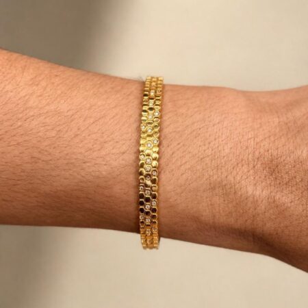 Brazalete oro diseño de pañal de abejas con circonita